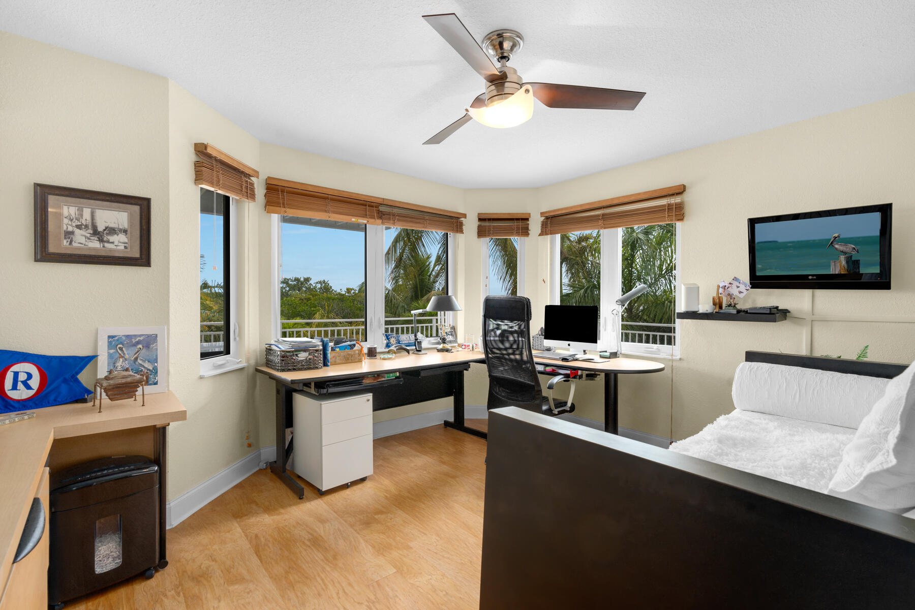 51 Mutiny Place Key Largo, FL 33037 - Photo 44 of 75 a living room with furniture flat screen tv and large window