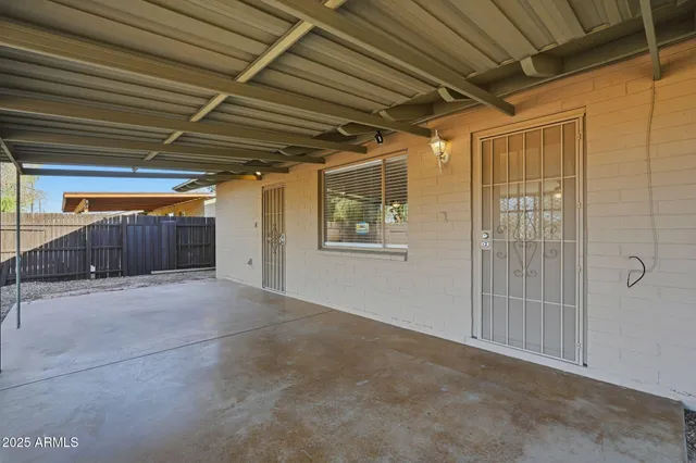 a view of a room with wooden walls