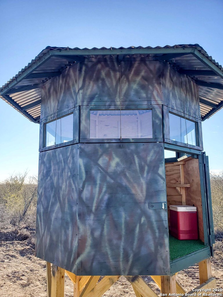 449 Double Eagle George West, TX 78022 - Photo 18 of 22 a backyard of a house with table and chairs
