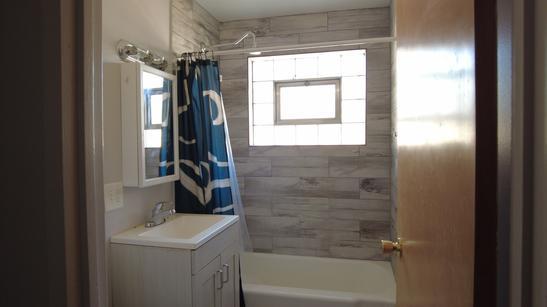 9215 South Pulaski Road, Unit 3N Evergreen Park, IL 60805 - Photo 8 of 8 a bathroom with a sink a toilet and shower