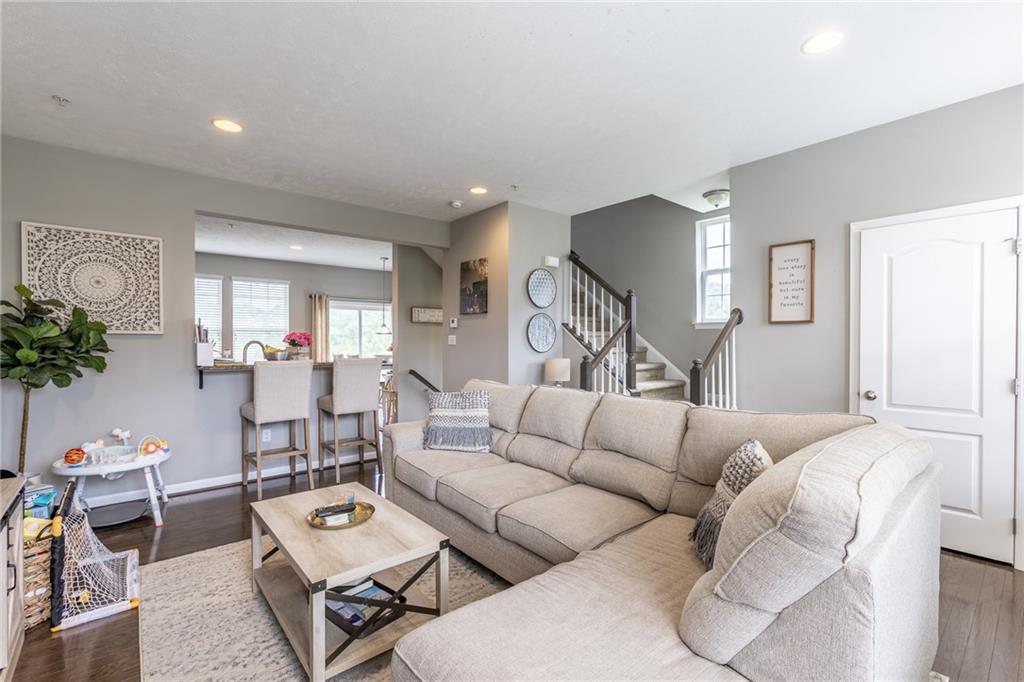 44 Truman Circle McKees Rocks, PA 15136 - Photo 11 of 36 a living room with furniture wooden floor and a potted plant