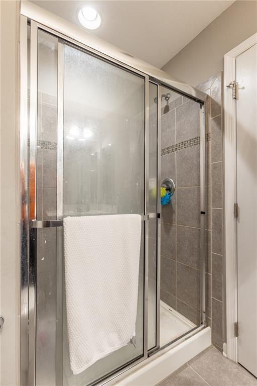 44 Truman Circle McKees Rocks, PA 15136 - Photo 21 of 36 a bathroom with a glass shower door
