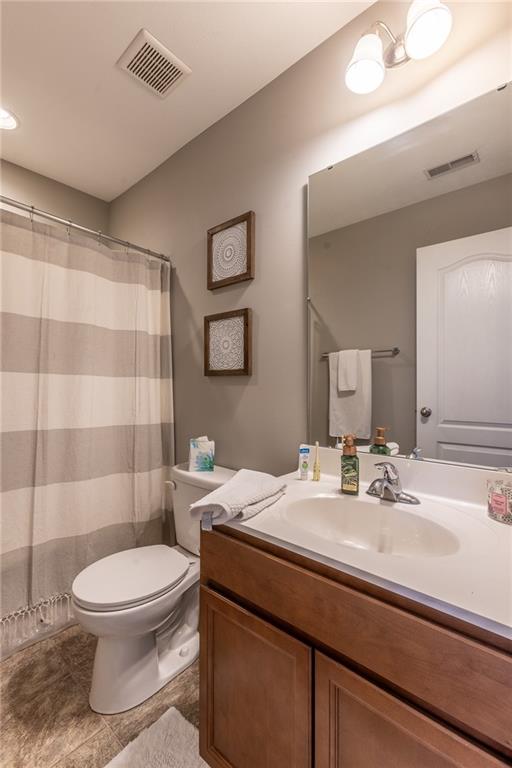 44 Truman Circle McKees Rocks, PA 15136 - Photo 24 of 36 a bathroom with a sink a toilet and shower