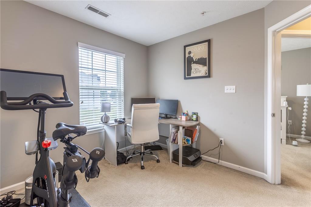 44 Truman Circle McKees Rocks, PA 15136 - Photo 26 of 36 a view of a workspace with furniture and a window