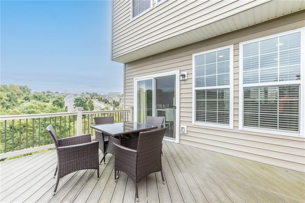 44 Truman Circle McKees Rocks, PA 15136 - Photo 34 of 36 a roof deck with chairs and wooden floor