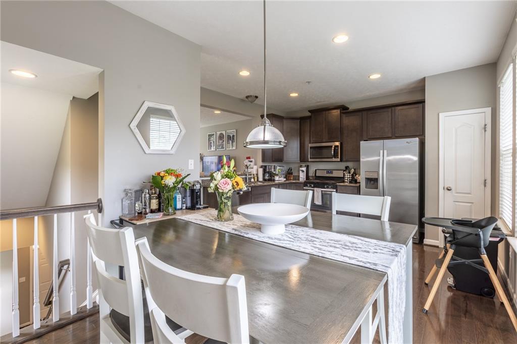 44 Truman Circle McKees Rocks, PA 15136 - Photo 6 of 36 a kitchen with stainless steel appliances granite countertop a sink refrigerator and microwave