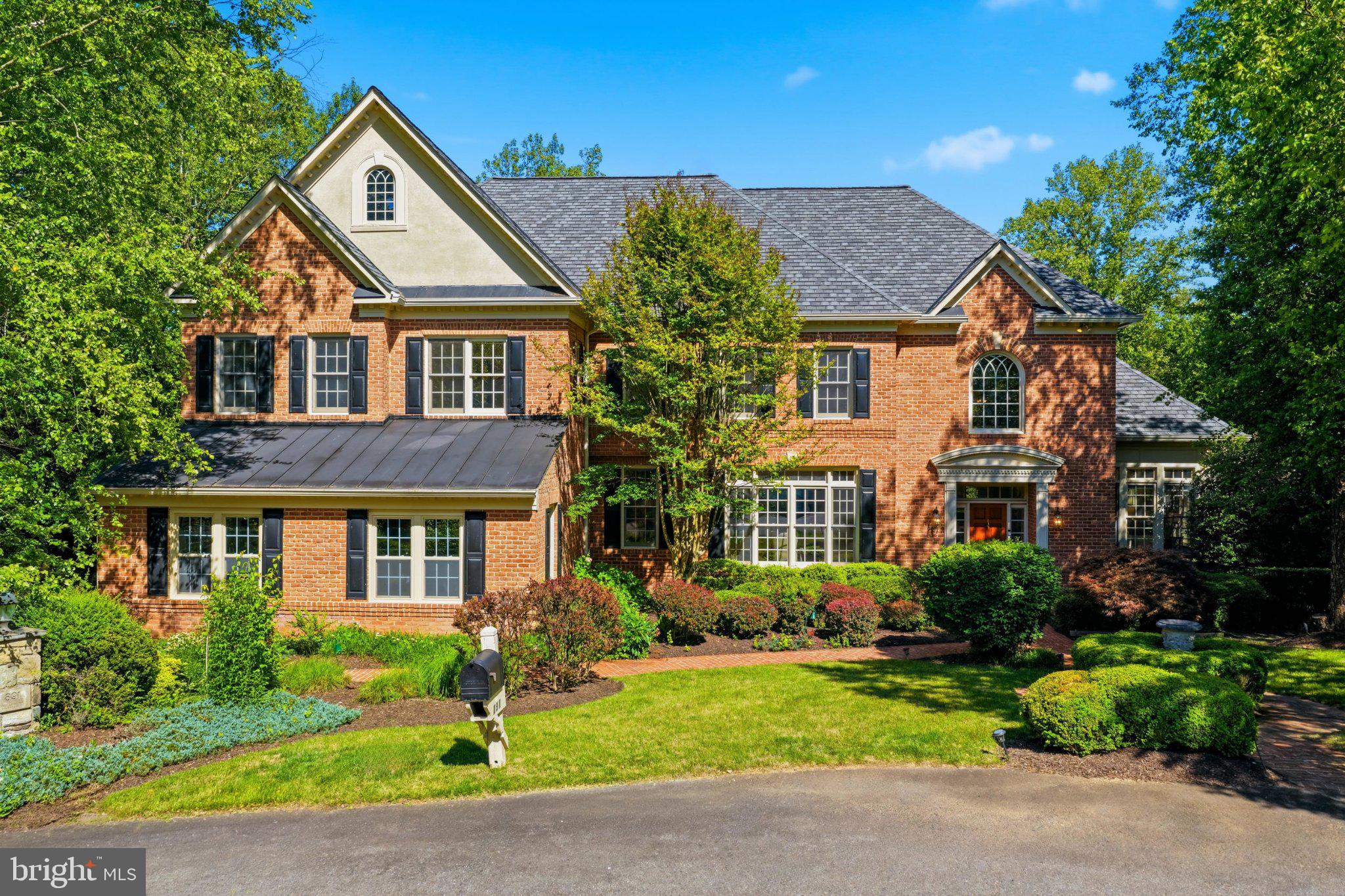 891 Chinquapin Road McLean, VA 22102 - Photo 3 of 78 Charming brick home in lush surroundings.