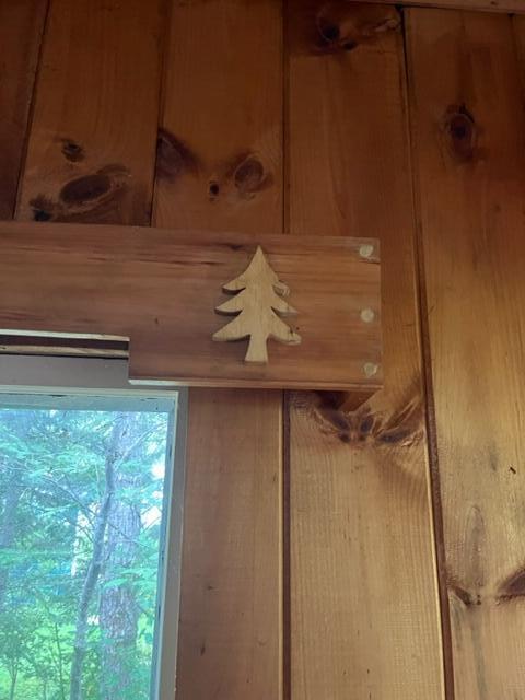 228 Shore Road Rangeley, ME 04964 - Photo 12 of 24 Carved Window Detail