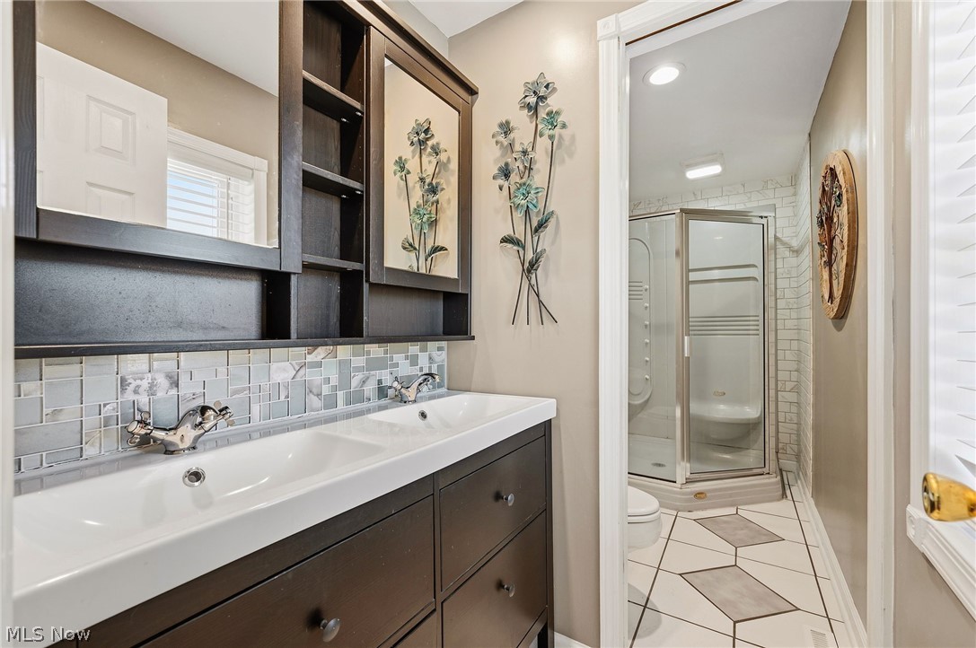 6832 Hillside Road Independence, OH 44131 - Photo 30 of 44 Primary bath with dual vanity and plenty of storage