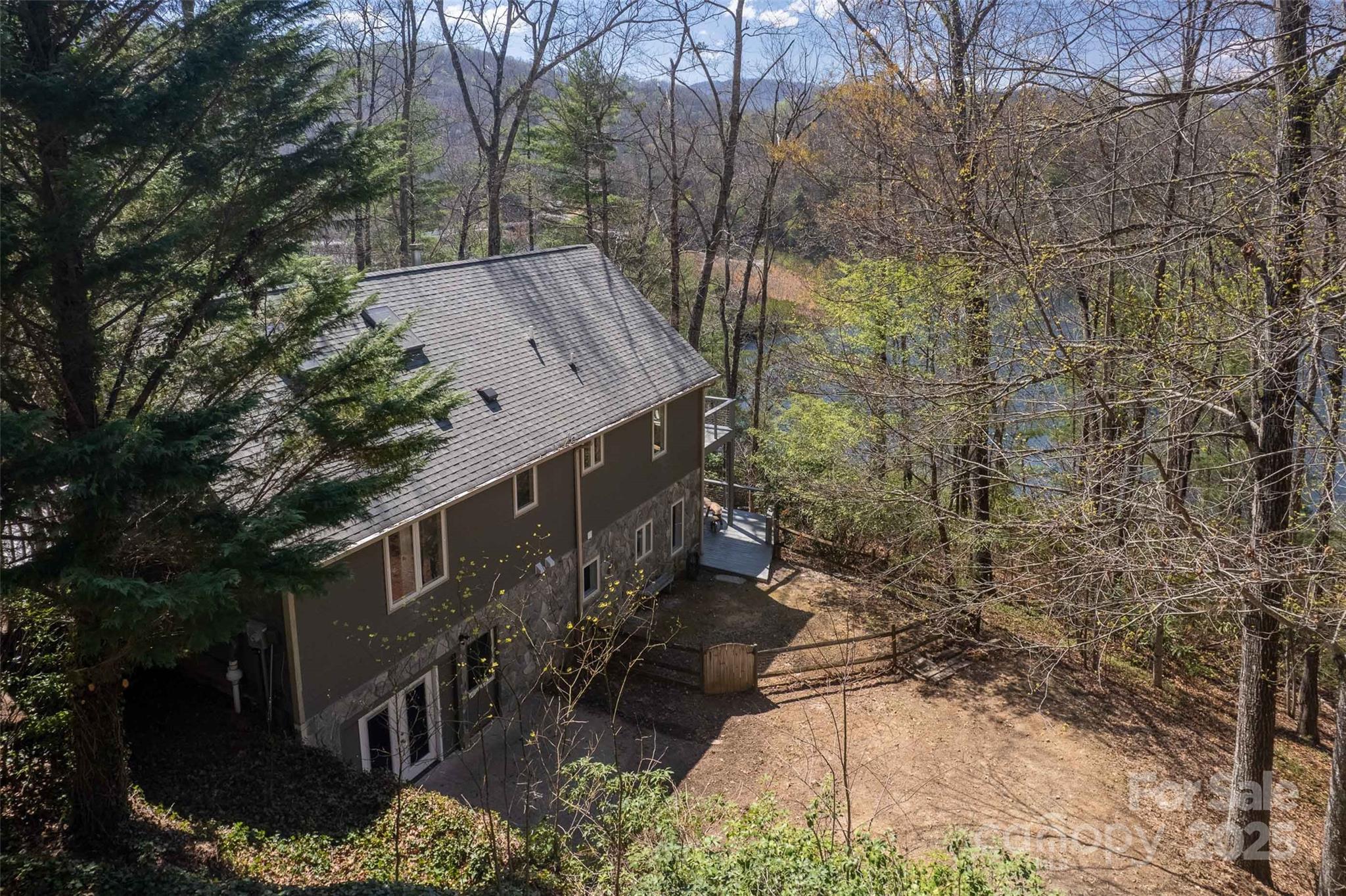 136 Dars Lane Tuckasegee, NC 28783 - Photo 11 of 39 a view of a house with a yard