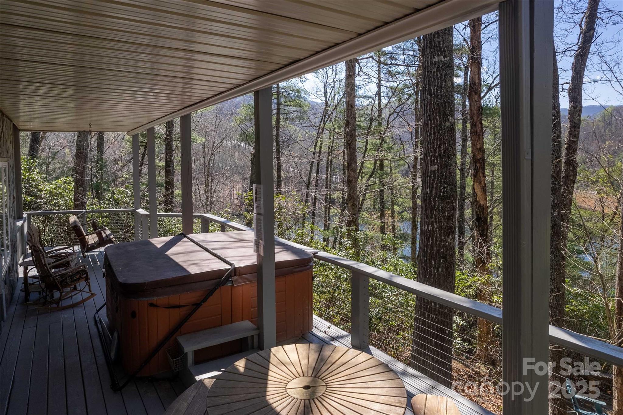 136 Dars Lane Tuckasegee, NC 28783 - Photo 15 of 39 a view of two chairs in the balcony