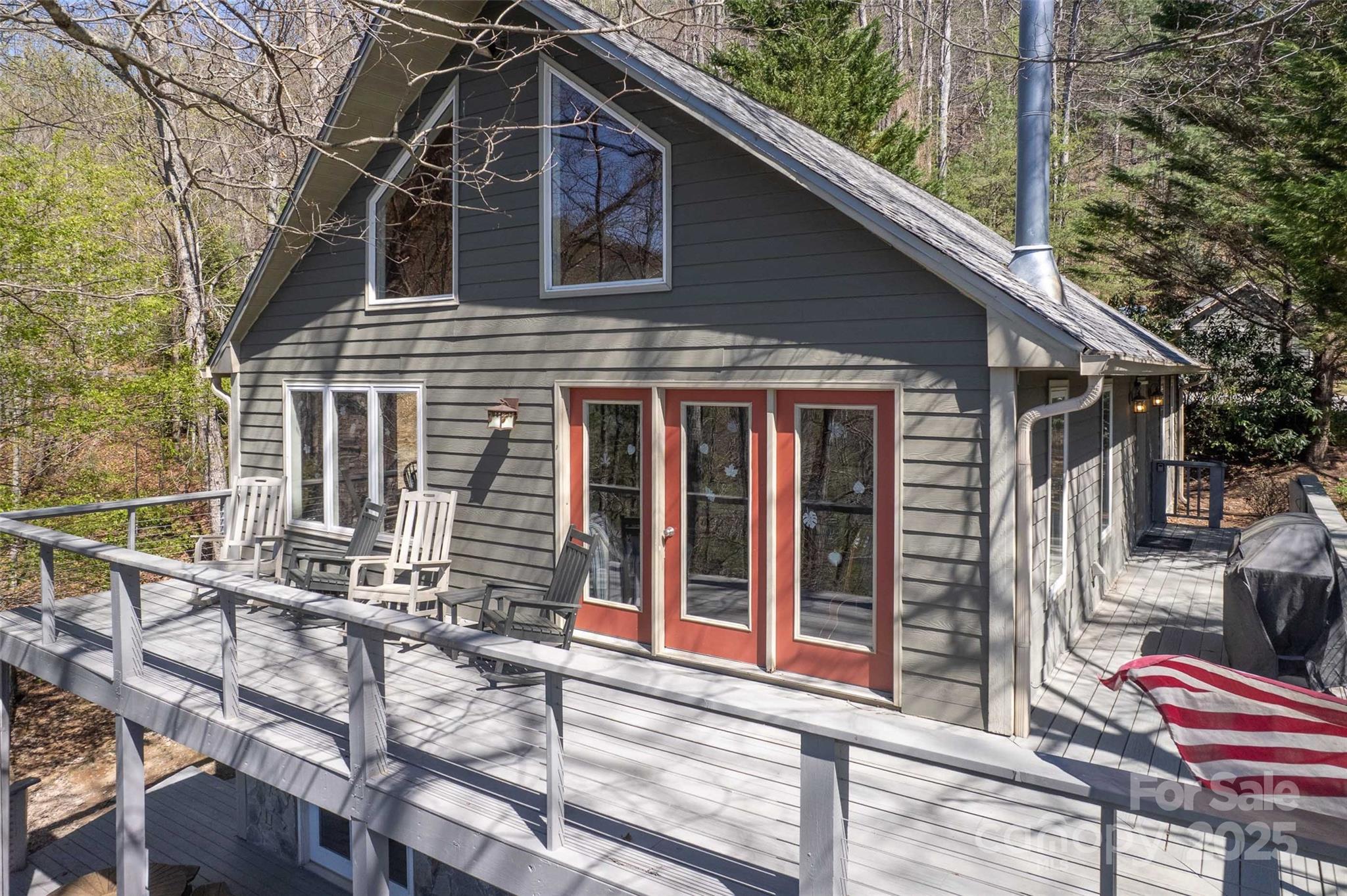 136 Dars Lane Tuckasegee, NC 28783 - Photo 2 of 39 a front view of a house with a yard