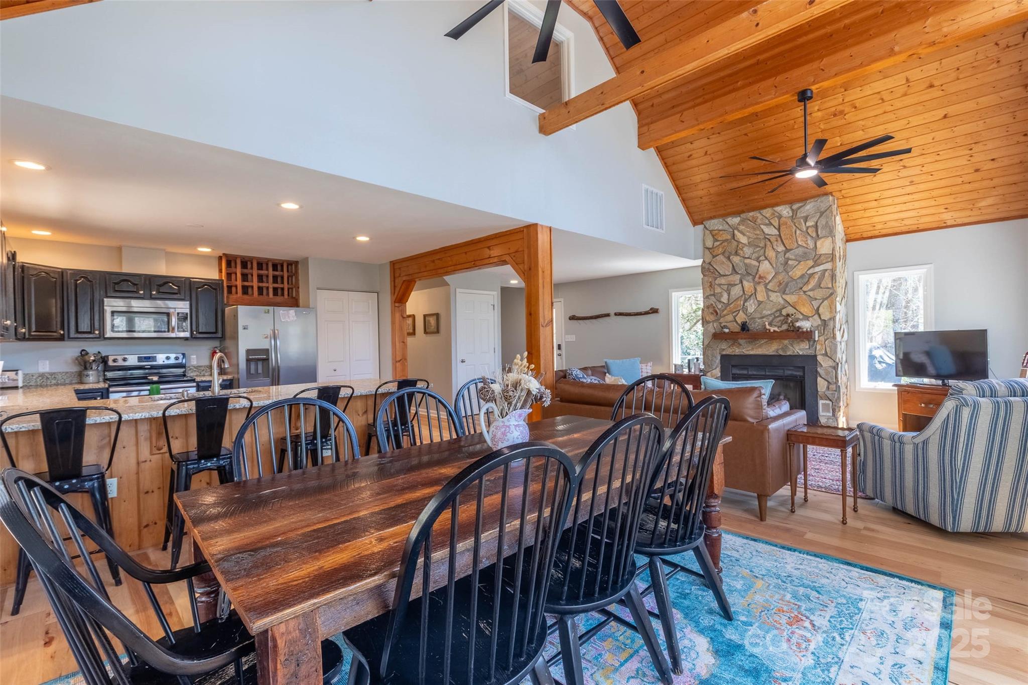 136 Dars Lane Tuckasegee, NC 28783 - Photo 22 of 39 a view of a dining room with furniture window and wooden floor