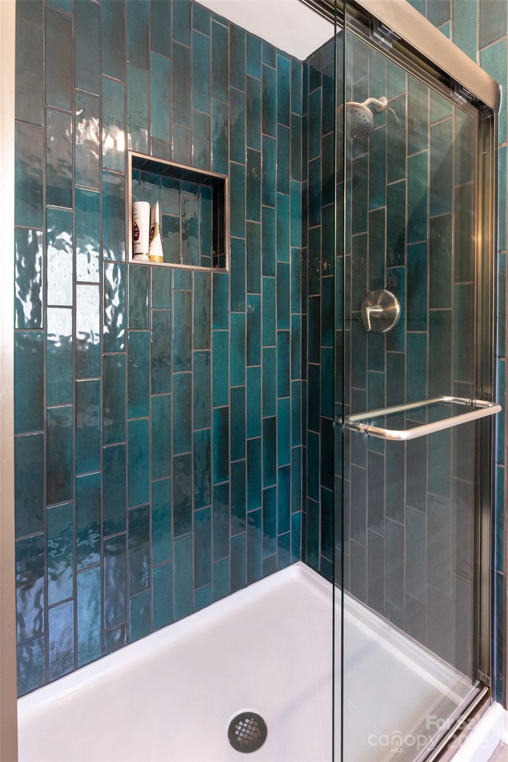 136 Dars Lane Tuckasegee, NC 28783 - Photo 27 of 39 a bathroom with a shower