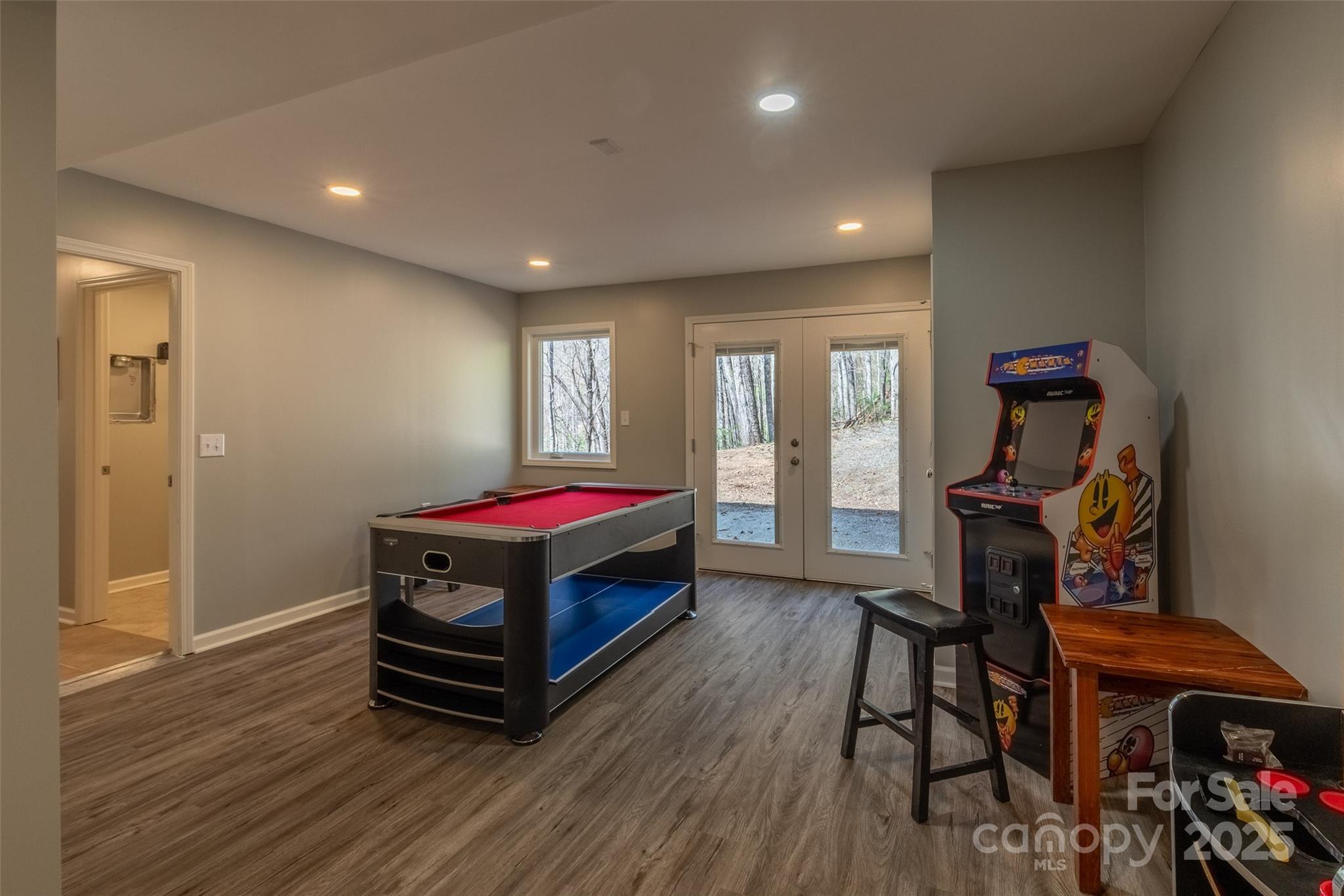 136 Dars Lane Tuckasegee, NC 28783 - Photo 34 of 39 a room with furniture and a wooden floor
