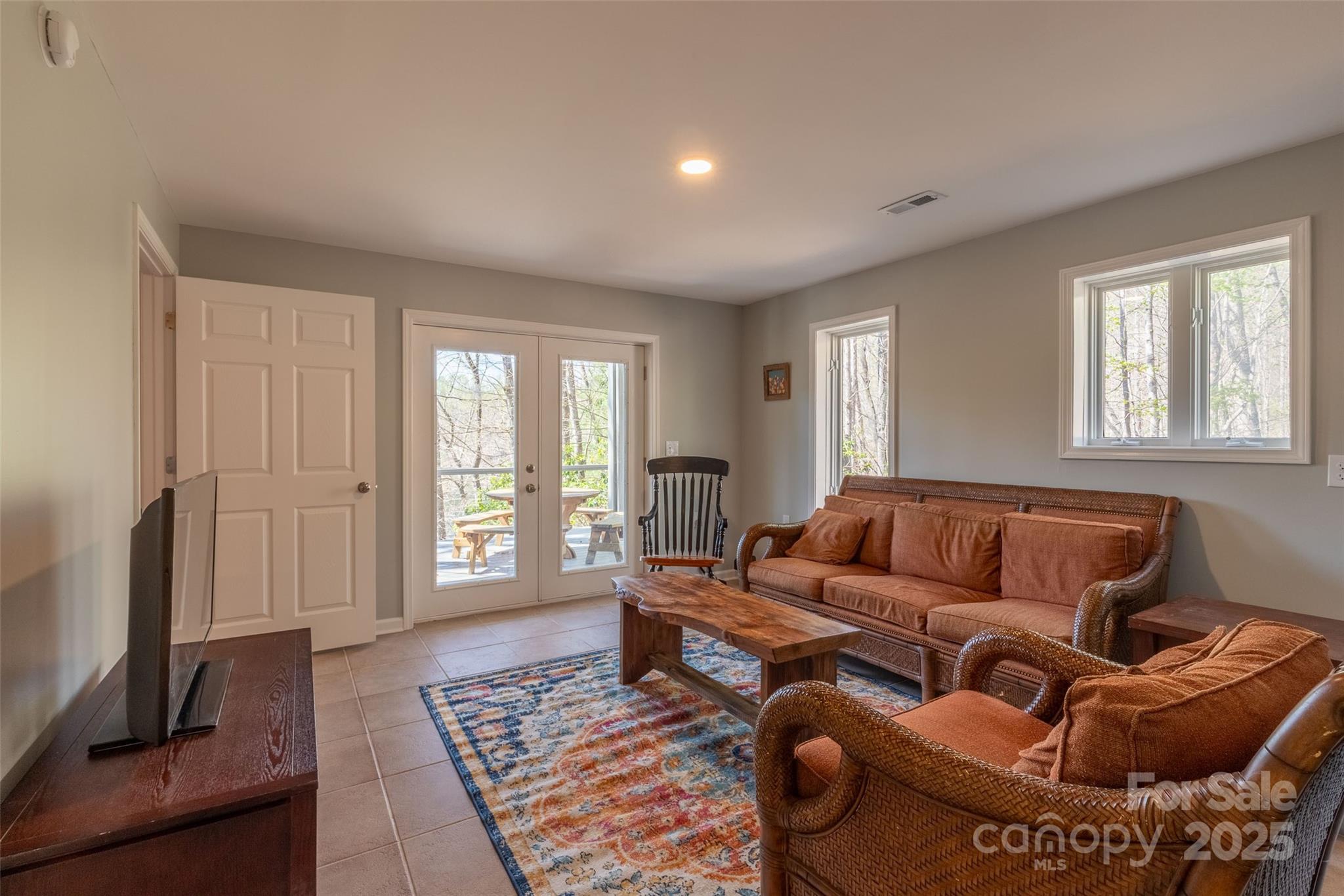 136 Dars Lane Tuckasegee, NC 28783 - Photo 38 of 39 a living room with furniture and a window