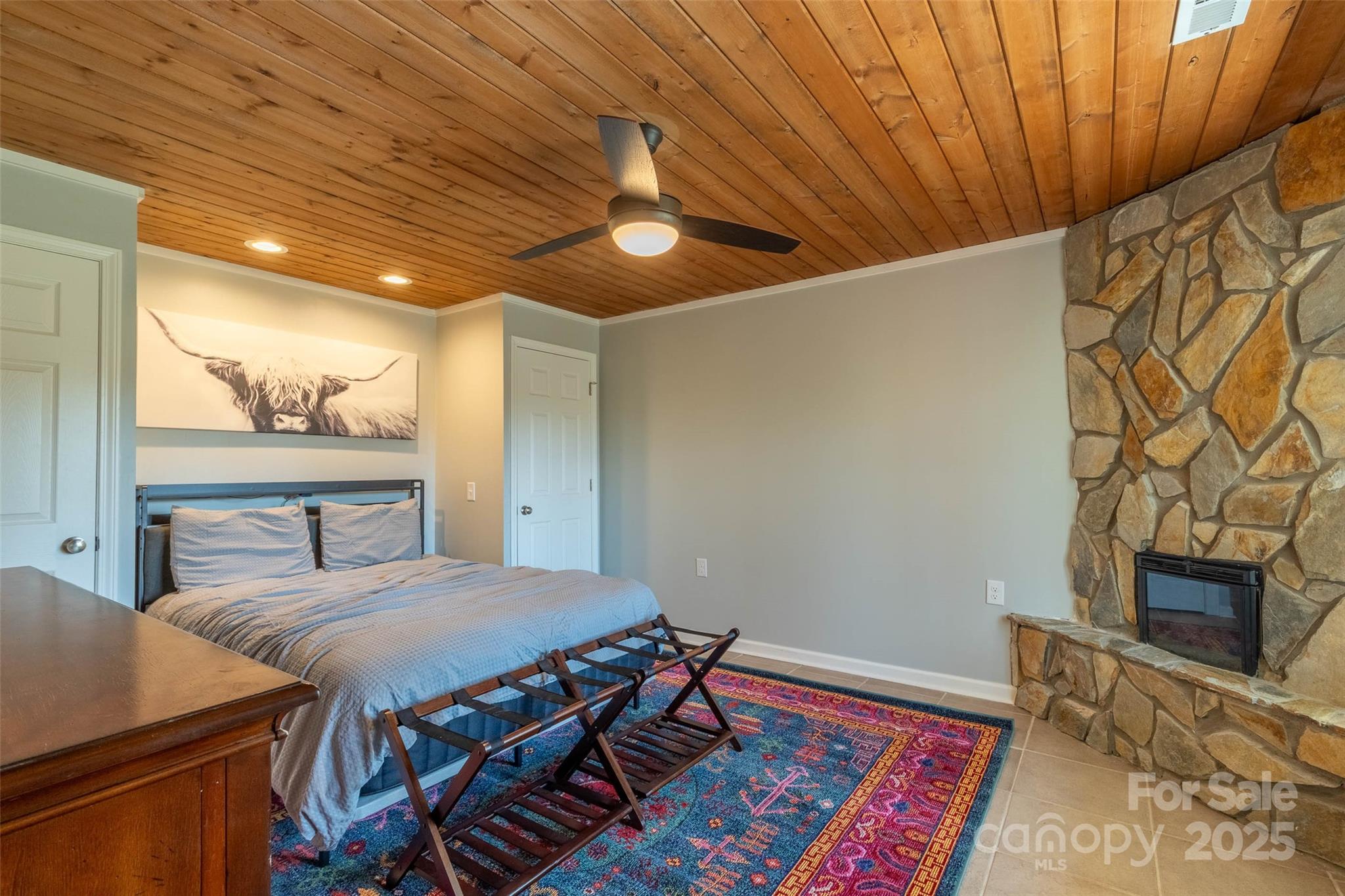 136 Dars Lane Tuckasegee, NC 28783 - Photo 39 of 39 a view of a livingroom with furniture and a flat screen tv