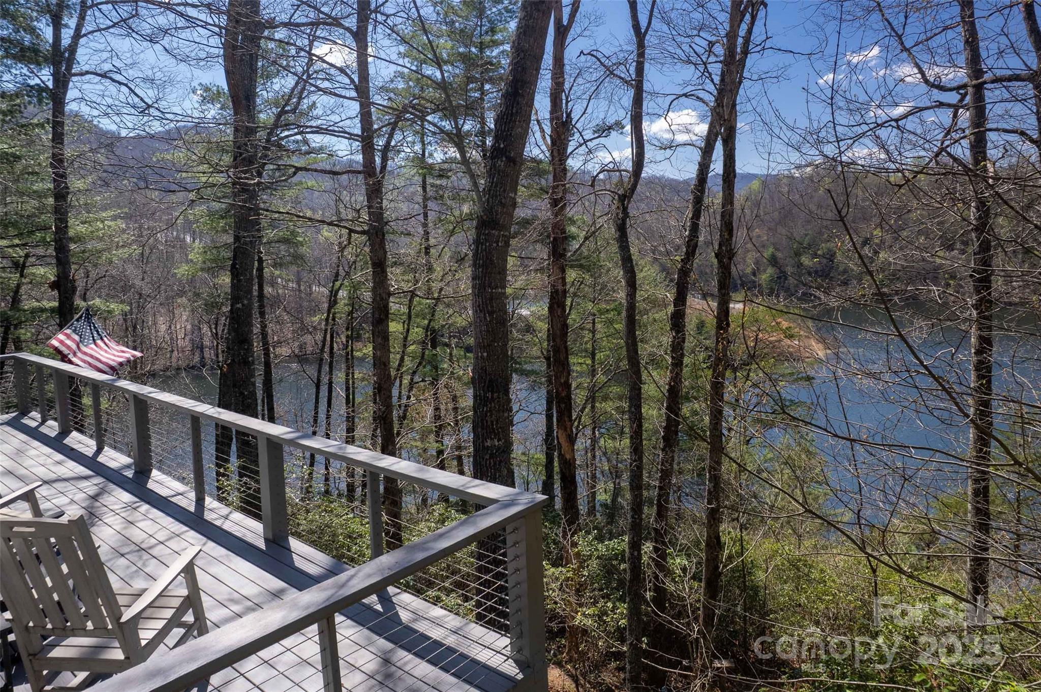 136 Dars Lane Tuckasegee, NC 28783 - Photo 4 of 39 a view of balcony with small trees