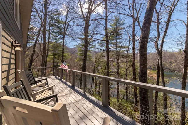 a view of a balcony with furniture