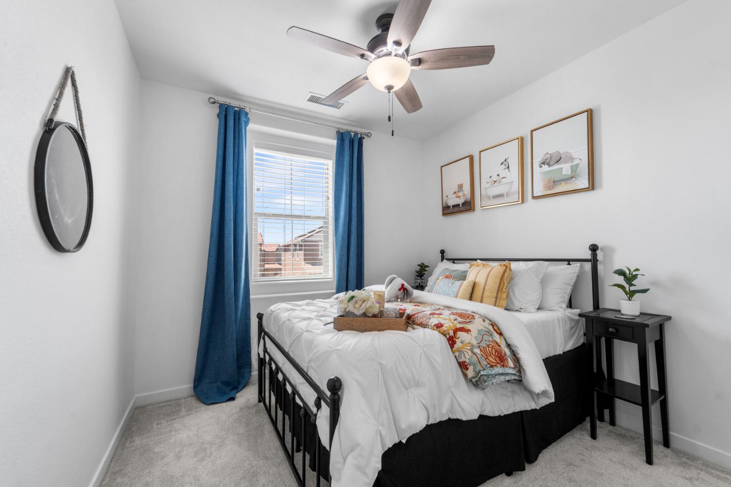 4301 San Miguel Road Madera, CA 93636 - Photo 34 of 60 a bedroom with bed and a chandelier