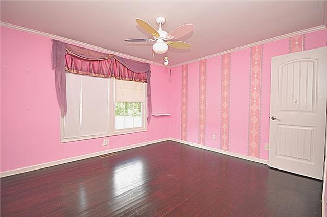 330 Shorter Road Lebanon, TN 37090 - Photo 13 of 20 an empty room with wooden floor fan and windows