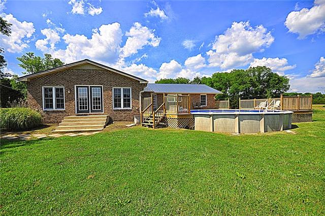 330 Shorter Road Lebanon, TN 37090 - Photo 4 of 20 a front view of a house with yard and green space