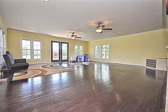 330 Shorter Road Lebanon, TN 37090 - Photo 9 of 20 a view of a livingroom with furniture wooden floor and a chandelier