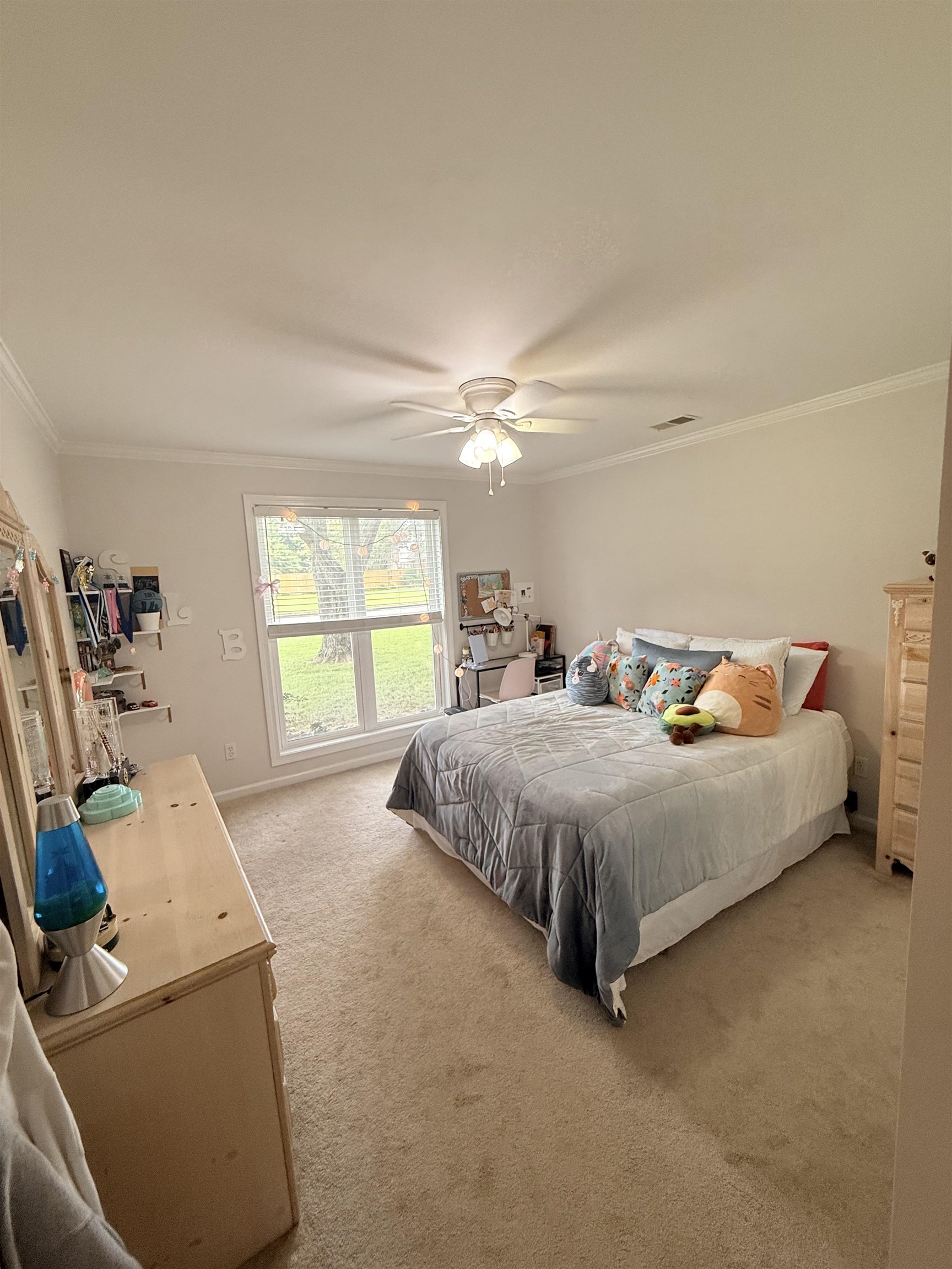 9140 Fox Ridge Road Germantown, TN 38139 - Photo 14 of 23 a spacious bedroom with a bed and window