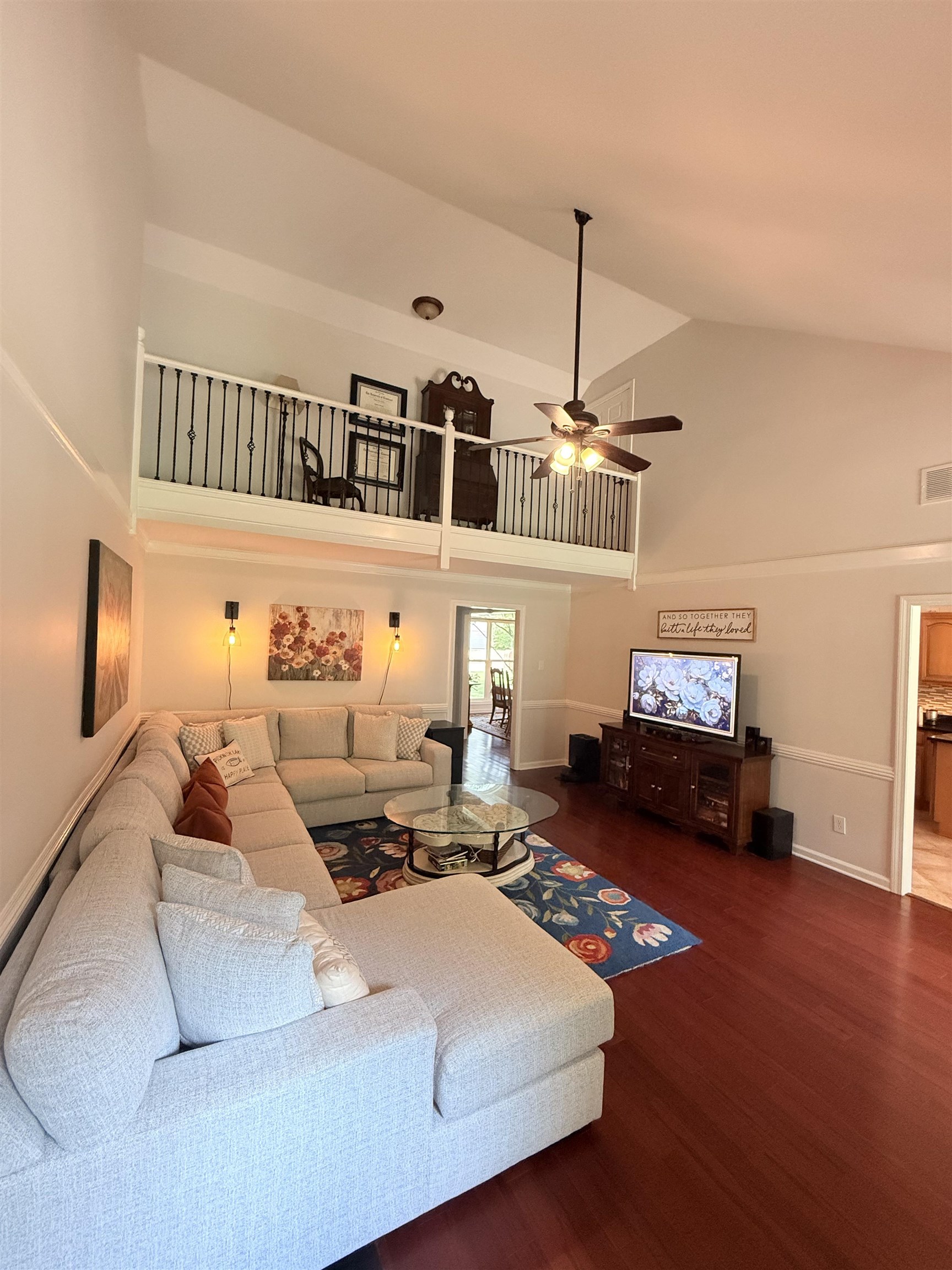 9140 Fox Ridge Road Germantown, TN 38139 - Photo 5 of 23 a living room with furniture and a chandelier