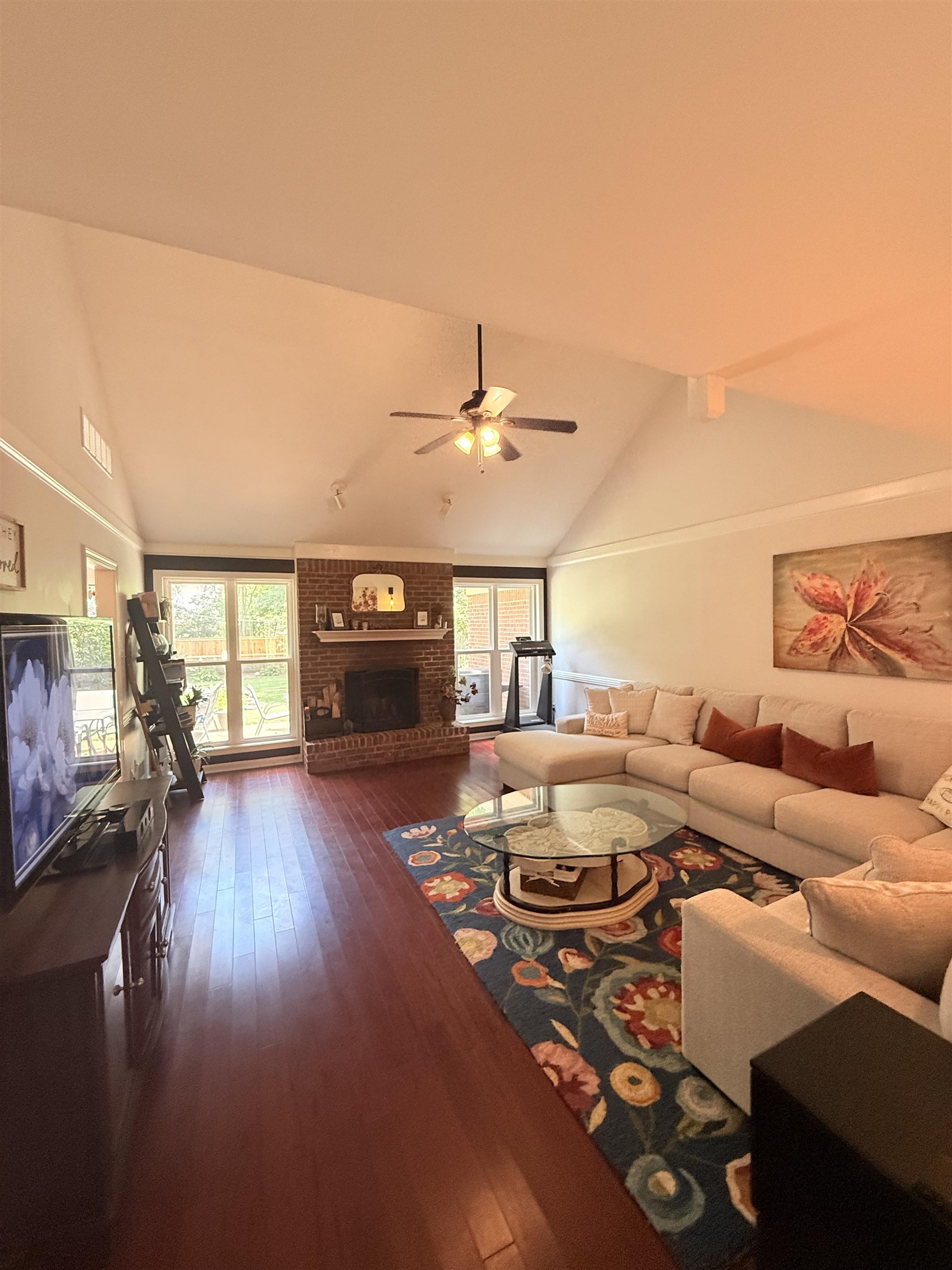9140 Fox Ridge Road Germantown, TN 38139 - Photo 6 of 23 a living room with furniture and wooden floor