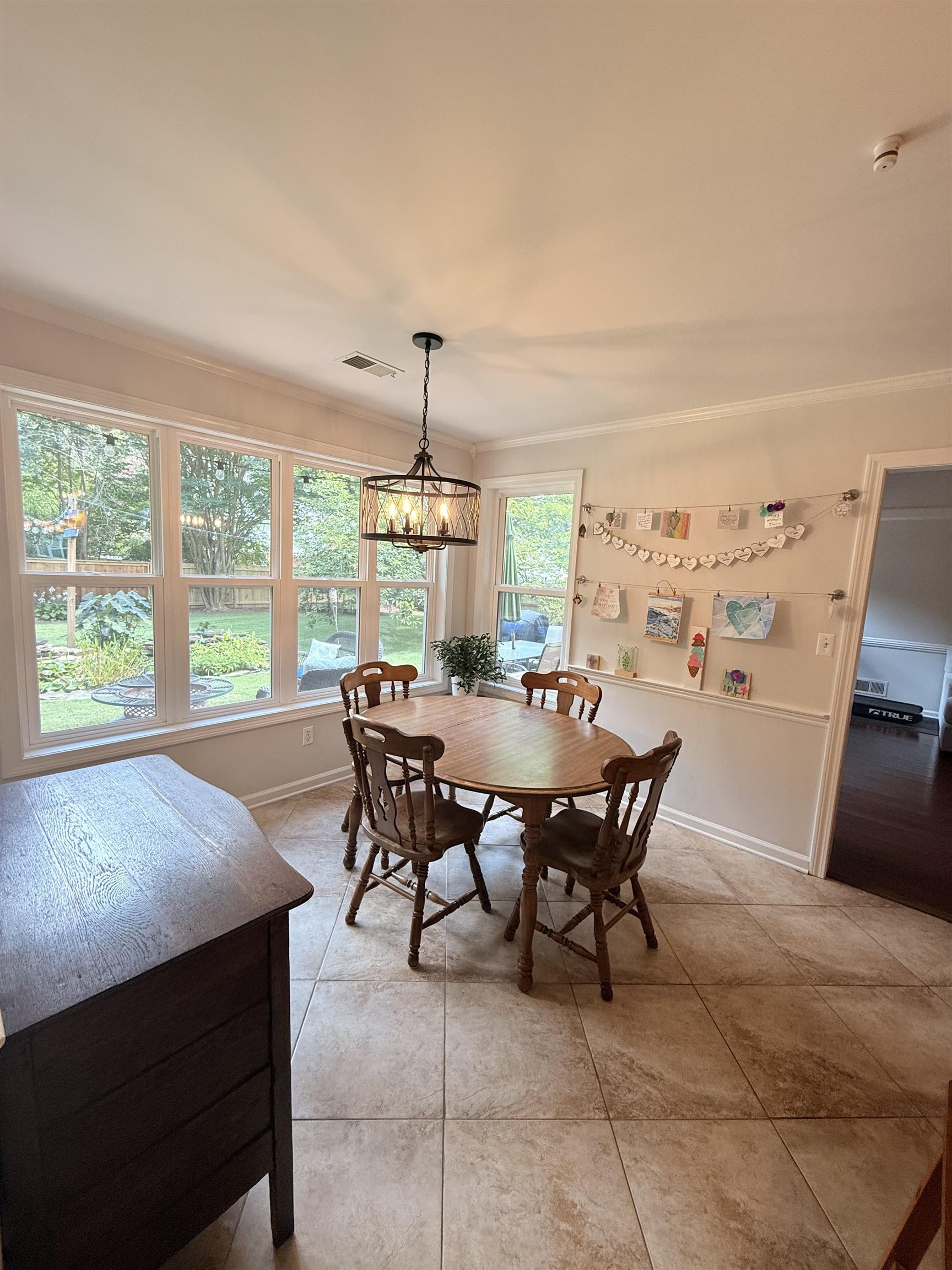 9140 Fox Ridge Road Germantown, TN 38139 - Photo 9 of 23 a view of a dining room with furniture window and outside view