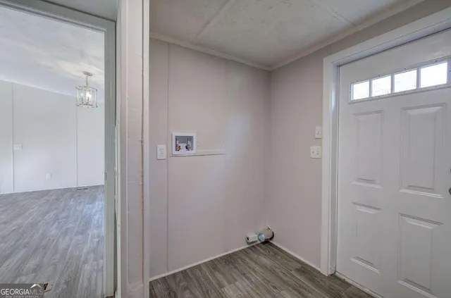 a view of small space with wooden floor