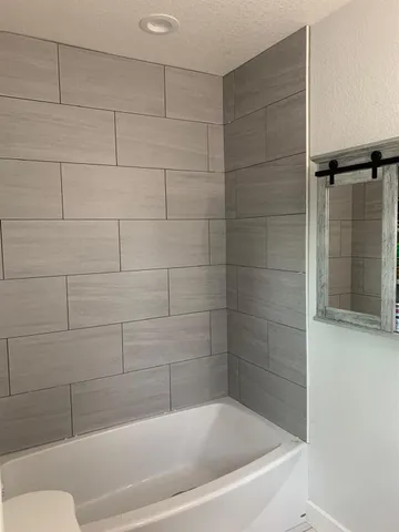 a bathroom with a bathtub