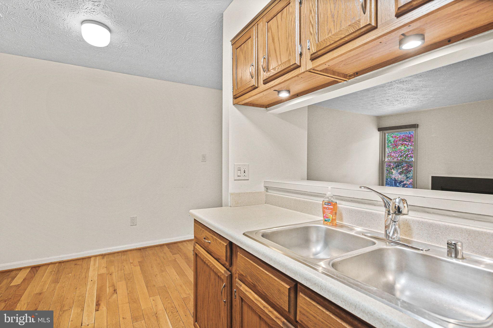 11450 Little Patuxent Parkway, Unit 605 Columbia, MD 21044 - Photo 13 of 33 a close view of sink and tap