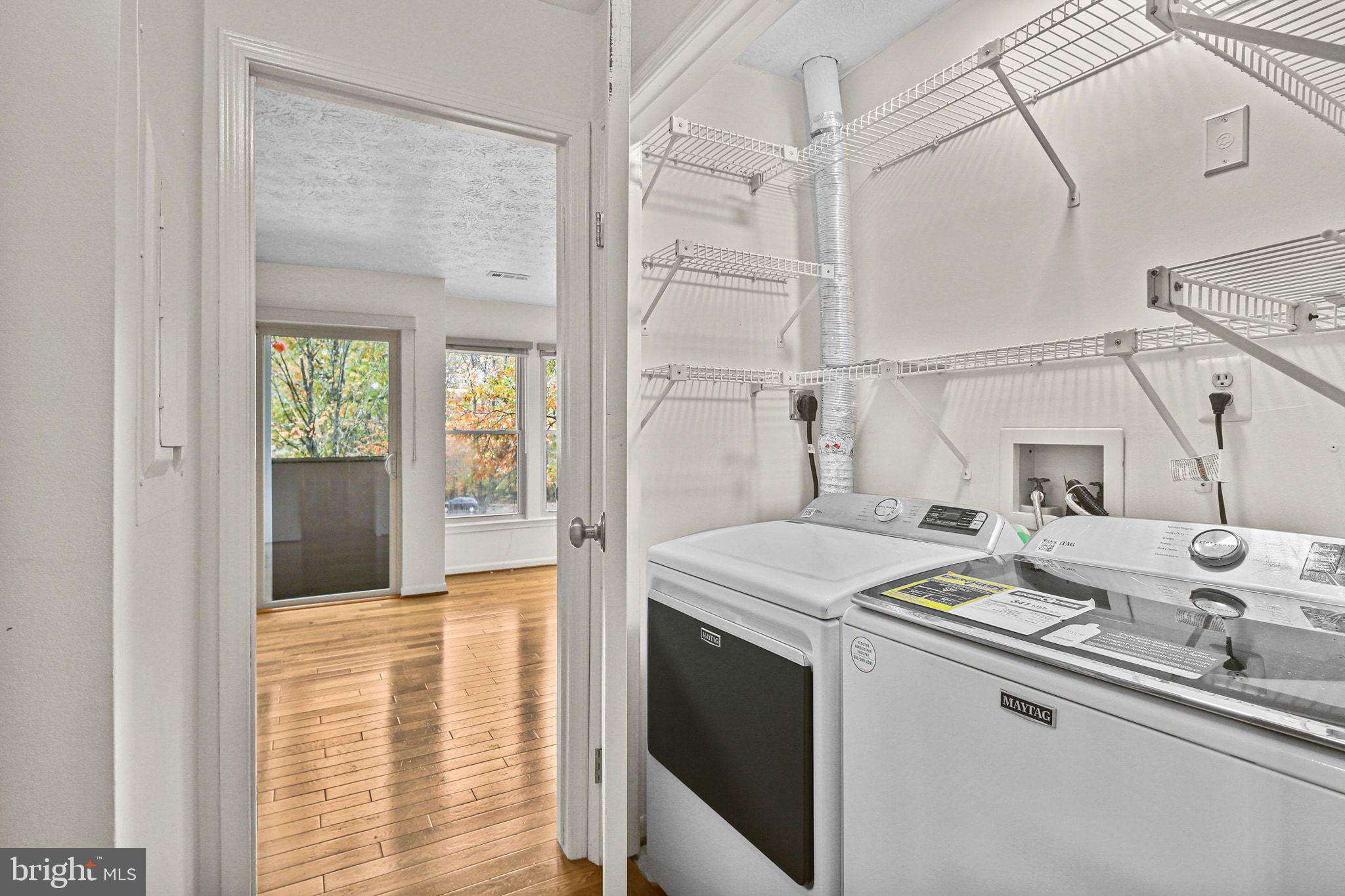 11450 Little Patuxent Parkway, Unit 605 Columbia, MD 21044 - Photo 14 of 33 a kitchen that has a sink and a stove