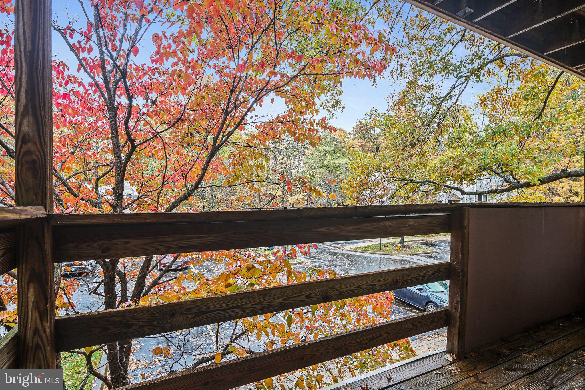 11450 Little Patuxent Parkway, Unit 605 Columbia, MD 21044 - Photo 31 of 33 a view of a couple of cars parked on road