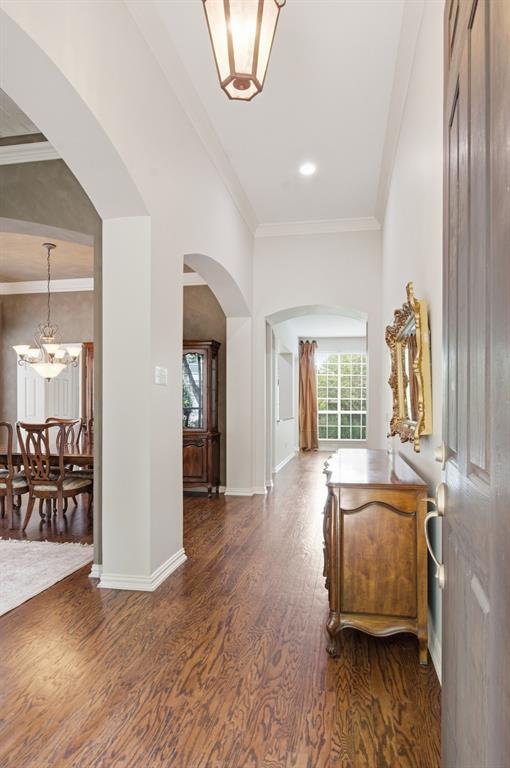 8180 Holliday Road Lantana, TX 76226 - Photo 3 of 31 The foyer greets you with lightness and brightness