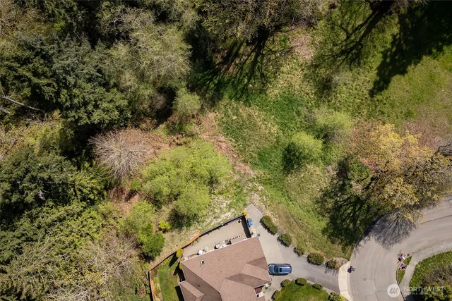an aerial view of residential house with outdoor space