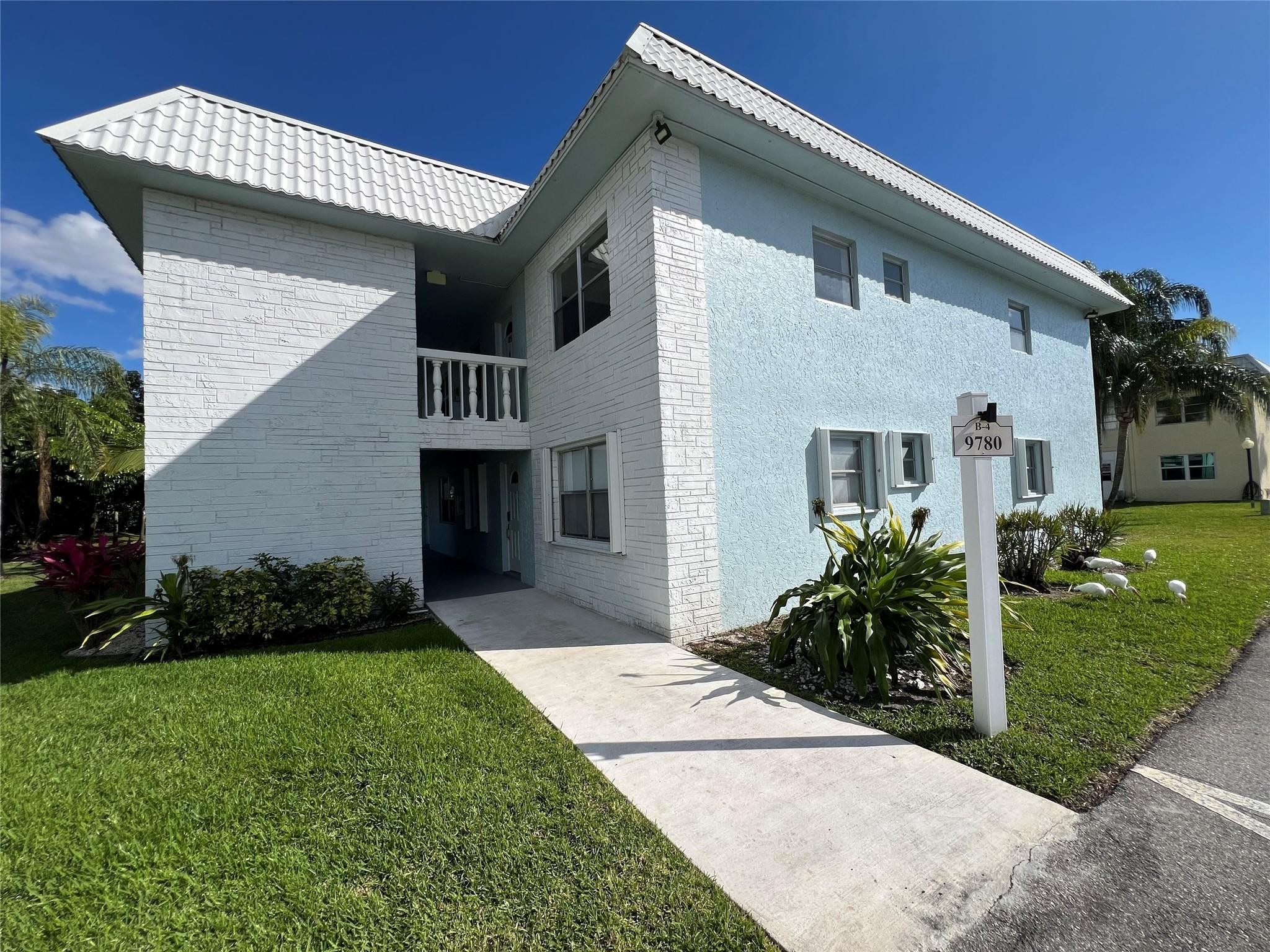 a front view of house with yard