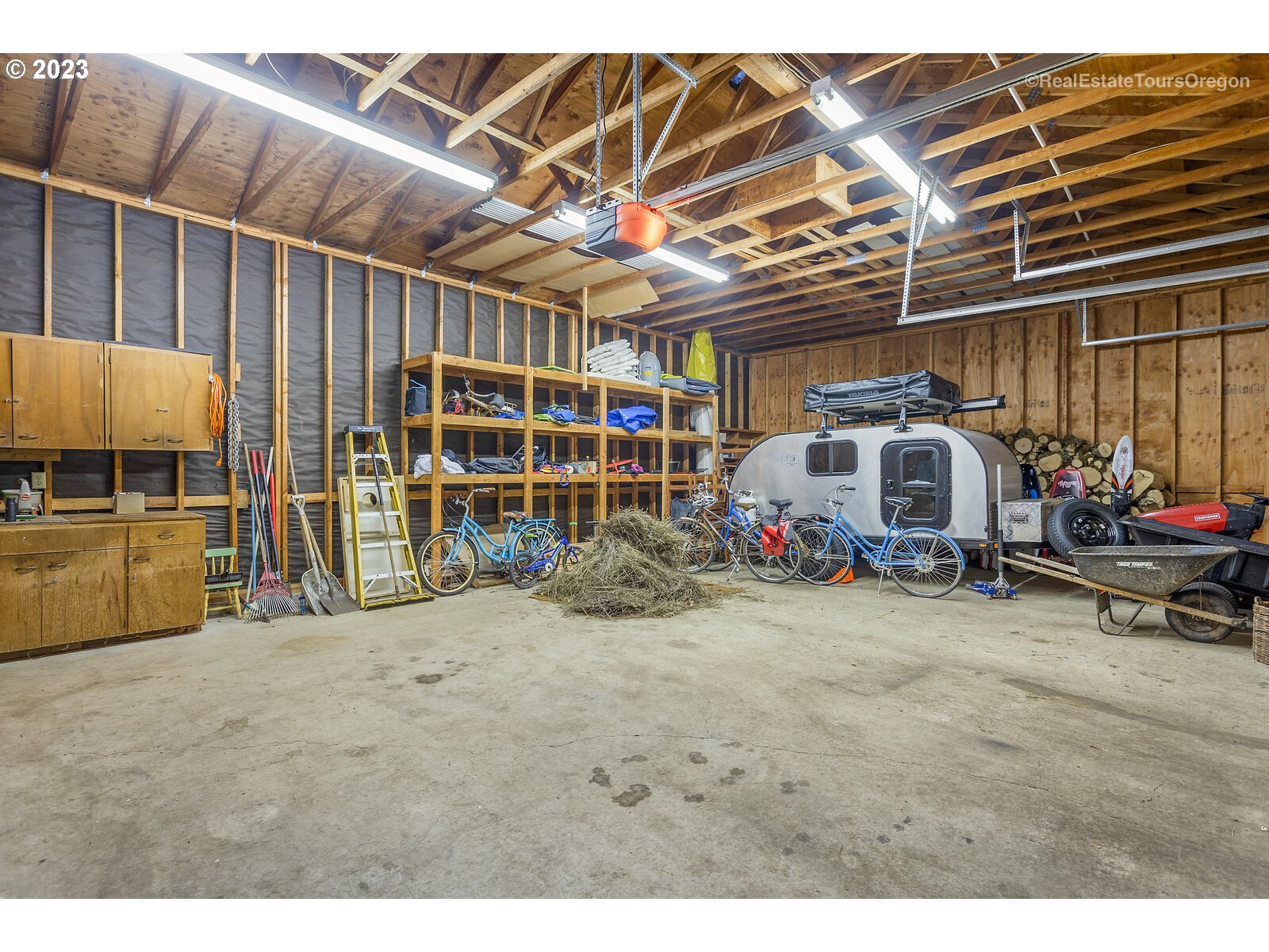 17224 Northwest Lucy Reeder Road Portland, OR 97231 - Photo 27 of 27 a view of a garage with storage