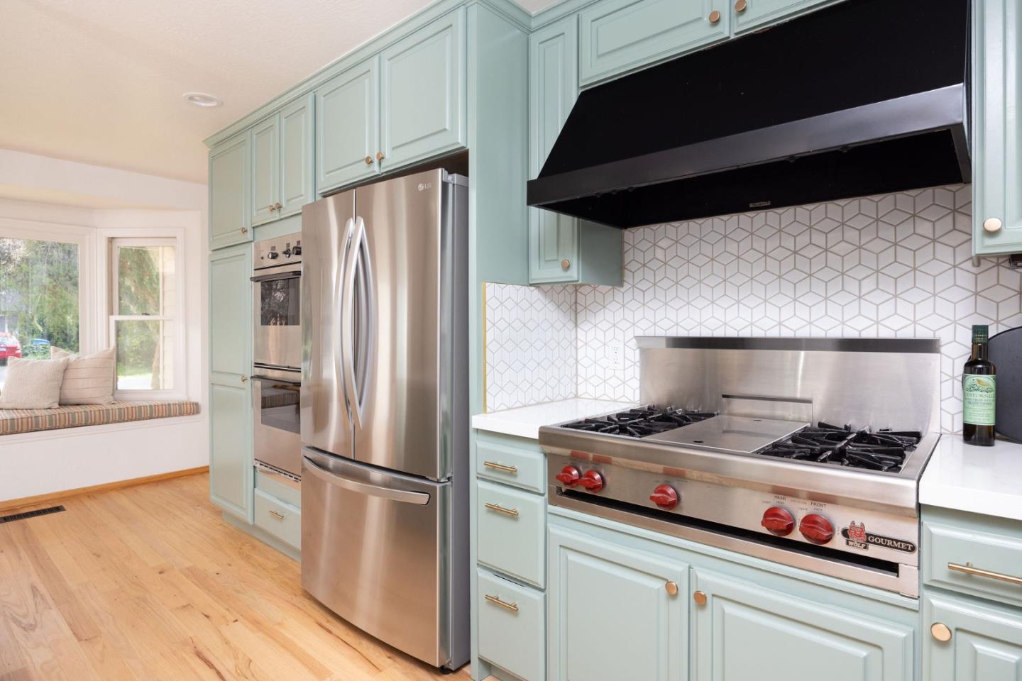 1160 Cedar Street Montara, CA 94037 - Photo 11 of 56 a kitchen with stainless steel appliances a refrigerator and a stove