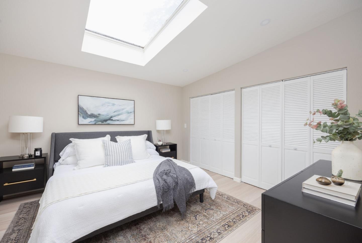 1160 Cedar Street Montara, CA 94037 - Photo 16 of 56 a bedroom with a bed and a potted plant