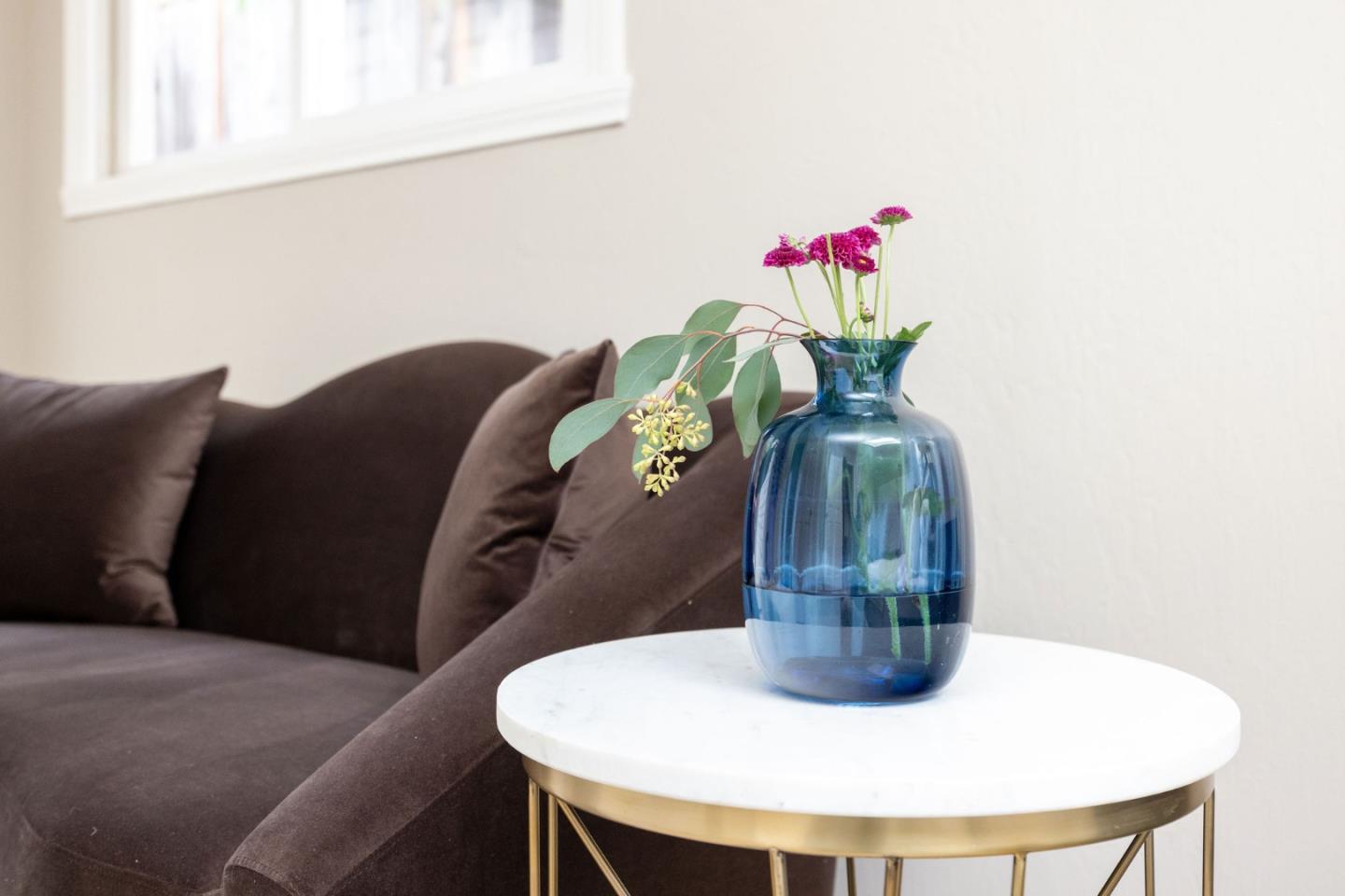 1160 Cedar Street Montara, CA 94037 - Photo 22 of 56 a vase of flowers sitting on a table