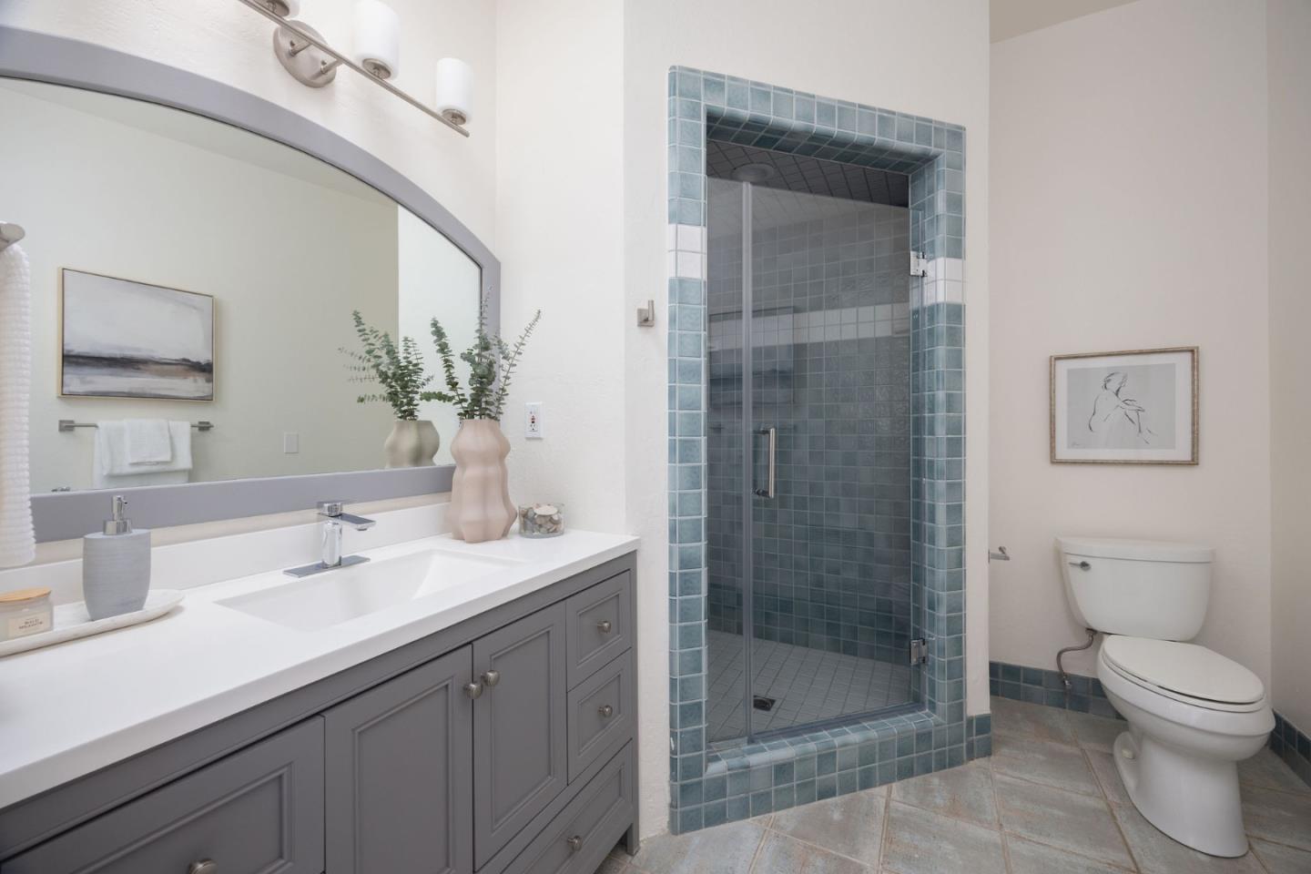 1160 Cedar Street Montara, CA 94037 - Photo 23 of 56 a bathroom with a granite countertop sink a toilet and shower