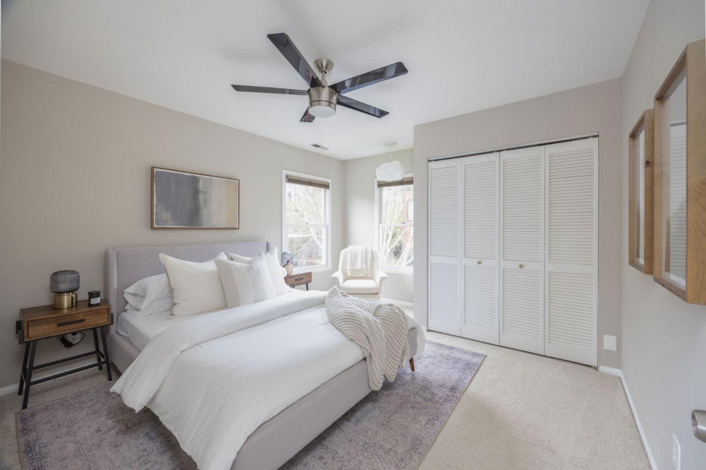 1160 Cedar Street Montara, CA 94037 - Photo 33 of 56 a bedroom with a bed and a chandelier