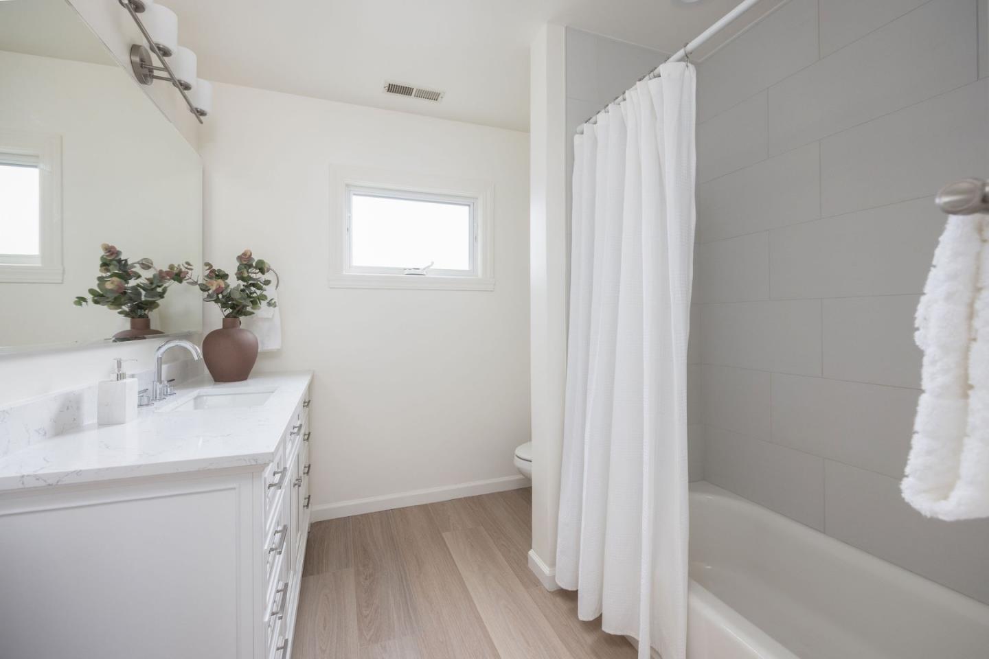 1160 Cedar Street Montara, CA 94037 - Photo 38 of 56 a bathroom with a sink a toilet and shower