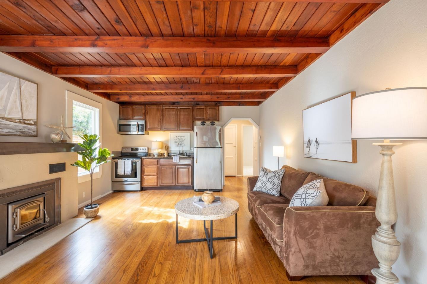 1160 Cedar Street Montara, CA 94037 - Photo 41 of 56 a living room with furniture and a wooden floor