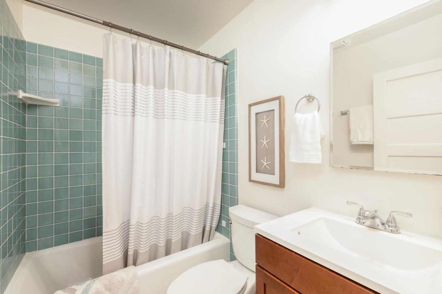 1160 Cedar Street Montara, CA 94037 - Photo 44 of 56 a bathroom with a sink toilet and shower