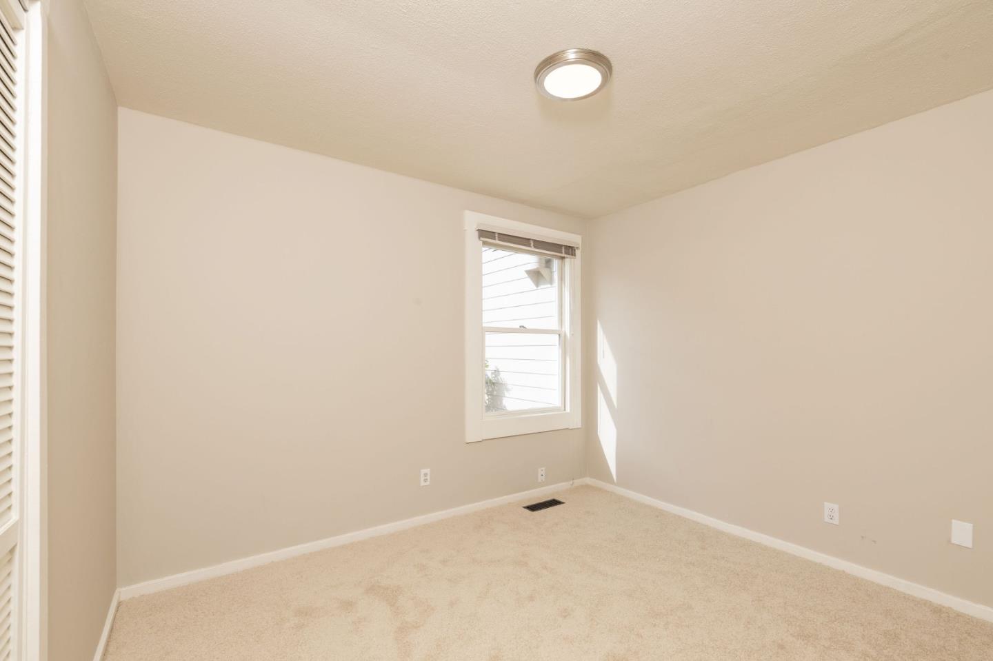 1160 Cedar Street Montara, CA 94037 - Photo 46 of 56 a view of an empty room with a window