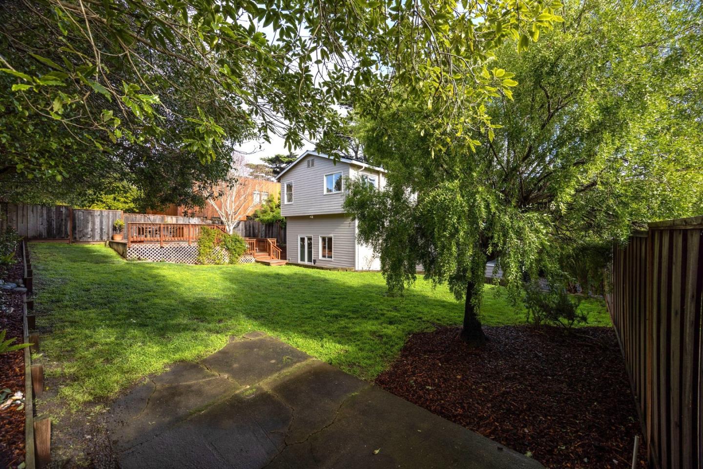 1160 Cedar Street Montara, CA 94037 - Photo 53 of 56 a front view of a house with garden